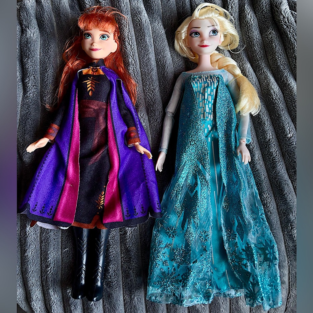 Gently used Ana and Elsa dolls